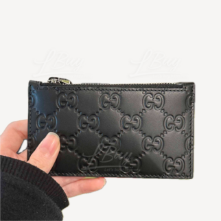 Gucci GG Logo 壓印皮革拉鍊卡包 黑色 779876